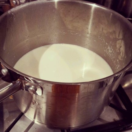 Heating the milk and cream to infuse flavour into the gelato base